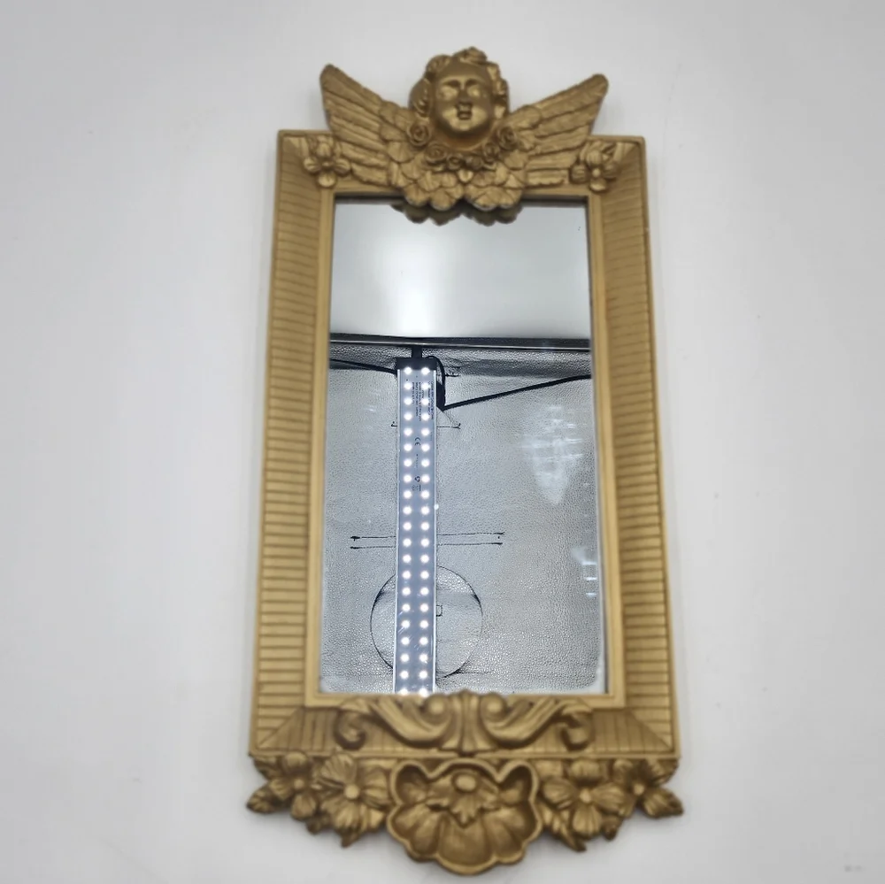 Vintage gold 80s Hollywood Regency Cherub Angel Figural Wall Mirror guilded